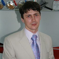 АК