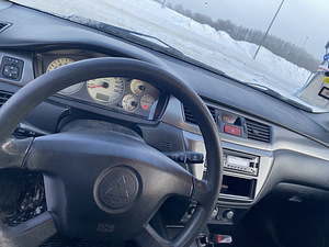 Mitsubishi lancer (6 фото из 7)