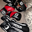 Щитки, шлем, перчатки, сумка и шорты для боевых искусств (фото #1)