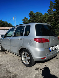 Mazda 2 1.4 бензин автомат (4 фото из 9)