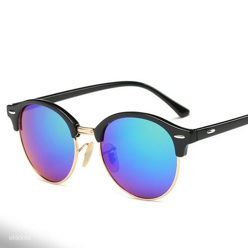 Новые стильные солнцезащитные очки (фото #4)
