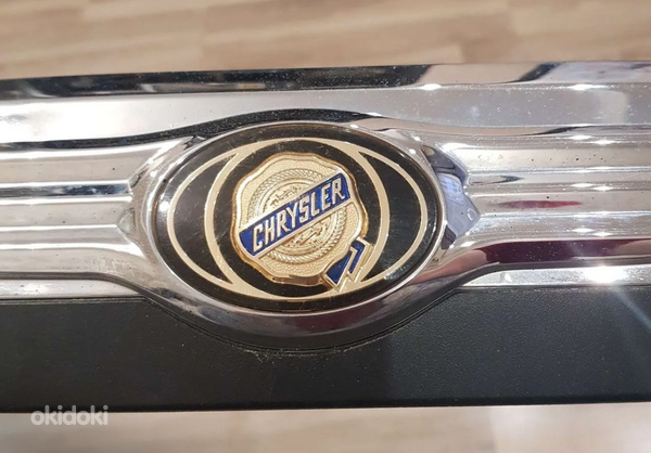 Отделка номерного знака Chrysler Grand Voyager V (фото #3)