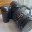 Nikon D90 + Nikkor AF 2.8 35-70 mm (foto #1)