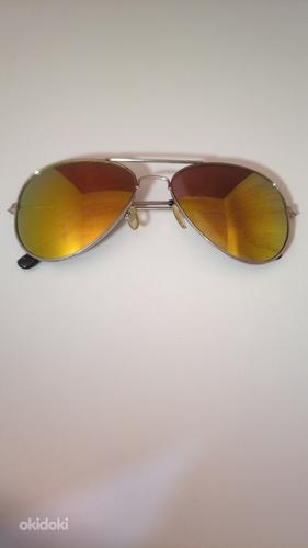 Солнцезащитные очки (фото #5)