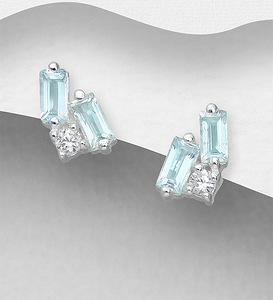 Серебряные серьги 925 пробы с голубым топазом (2 фото из 4)
