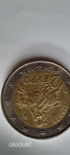 Редкая монета ,нецтр смещен греция 2002г (фото #1)