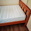 Деревянная кровать (фото #1)
