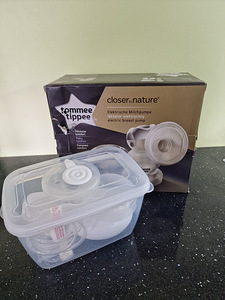 Молокоотсос Tommee tippee (2 фото из 2)