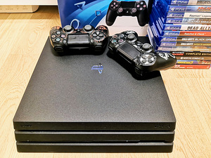 PS4 Pro 1 TB + Mängud (14 cd) + 2 pulti ja konto mängudega (1 foto / 8)
