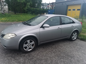 Nissan Premera (2 foto / 14)