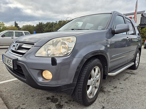 Honda CR-V 2006 a. (9 foto / 9)