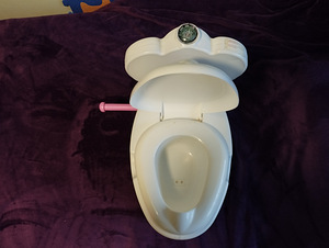 Laste WC-pott koos loputusheliga. (3 foto / 4)
