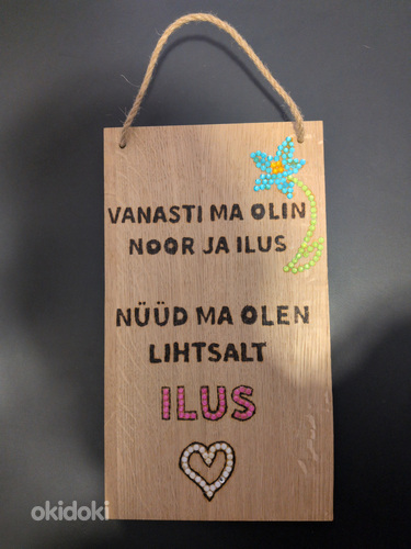 Puidust silt Noor ja ilus
