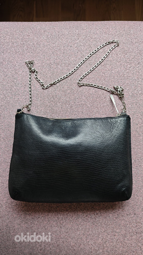 Jigsaw leather clutch