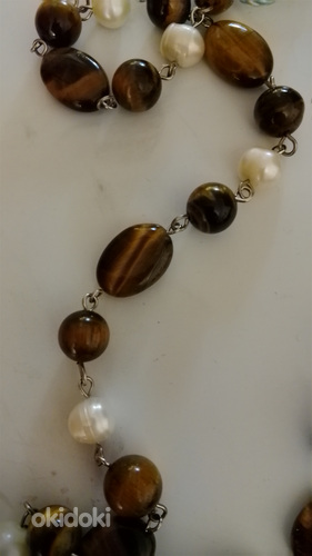 TIIKERIN SILMÄ JALOKIVI KAULAKORU 50 JALOKIVEÄ KORUSSA