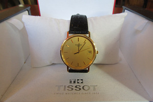 Kuld Tissot kuldkäekell meestele (2 foto / 8)