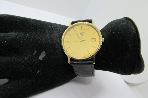 Tissot kuldkäekell meestele nahkrihmaga