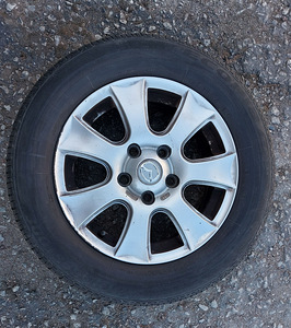 Литые диски Mazda 15" с летними шинами Bridgestone (1 фото из 5)
