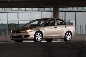 Mitsubishi Lancer 1.5 80kW (11 foto / 11)