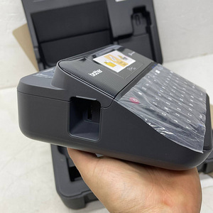 Принтер этикеток Brother PT-D600VP 24 мм (9 фото из 10)
