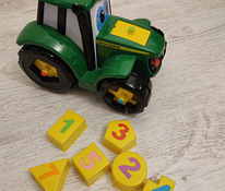 Traktor numbriga, figuuriga, ja värviga