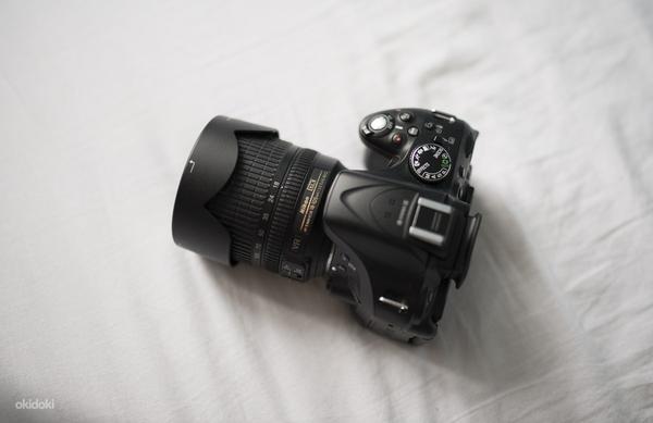 Nikon D5200 + AF-S DX Nikkor 18-105 мм f / 3.5-5.6G VR ED (фото #1)