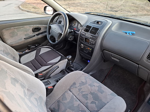 Mitsubishi Carisma GLS (11 foto / 14)