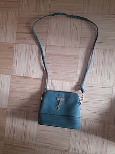 Женские сумки (3 фото из 10)