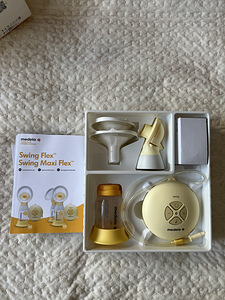 Молокоотсос Medela (2 фото из 2)