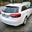 Opel Insignia SPORTS TOURER SW 2.0 ECOTec 120 кВт (фото #4)