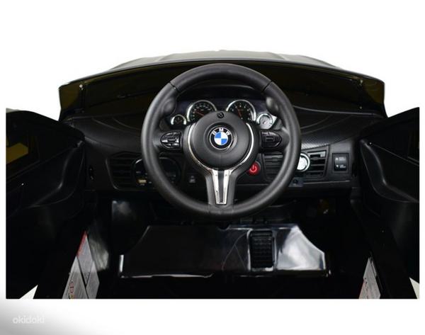 Детский черный электромобиль BMW X6M с пультом (фото #2)
