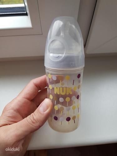 Детская бутылочка NUK (фото #1)