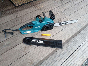Elektrisaag Makita UC4041A (1 foto / 4)
