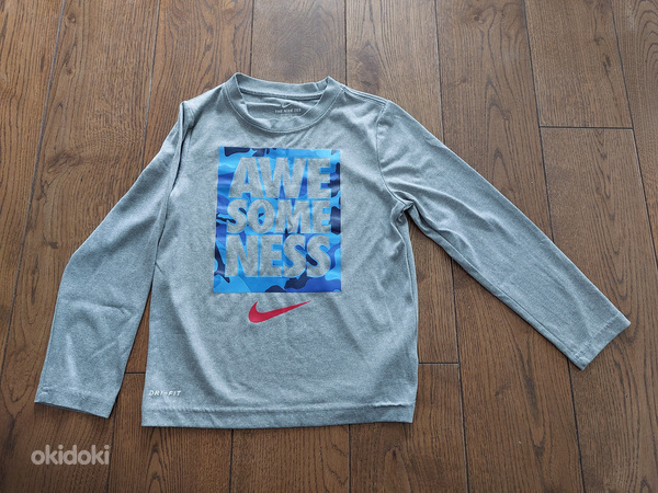 Спортивная футболка Nike приличного размера 116-122 (фото #1)