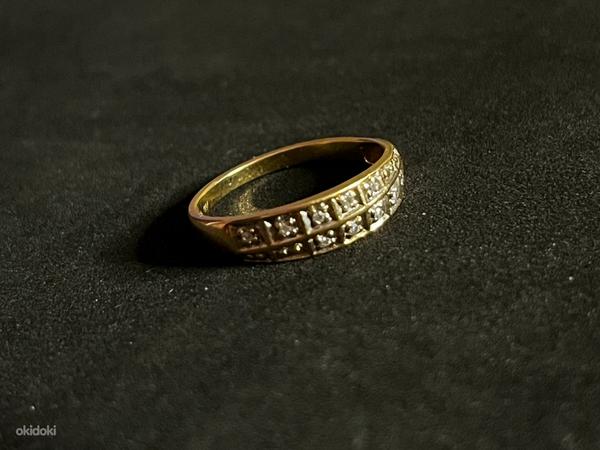 Kuld sõrmus teemantidega 750 proov (№K228) (foto #1)