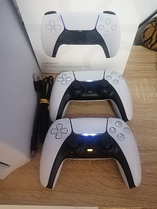 PlayStation 5 / PS 5 + 2 joysticki ja 2 mängu. (7 foto / 8)