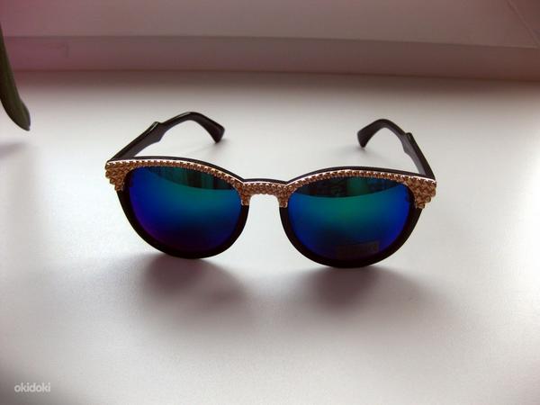 Модные солнцезащитные очки (фото #2)