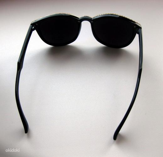 Модные солнцезащитные очки (фото #3)