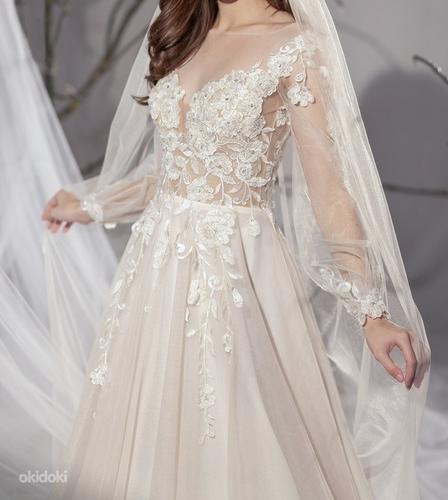 Очень красивое свадебное платье S Цена магазина 750 евро (фото #1)