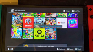 Nintendo Switch OLED + Дорожный футляр + Игры (4 фото из 6)