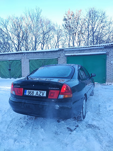 Mitsubishi Carisma (6 foto / 8)