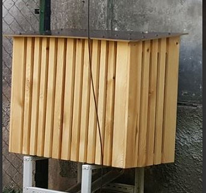 Деревянный защитный короб воздушного теплового насоса