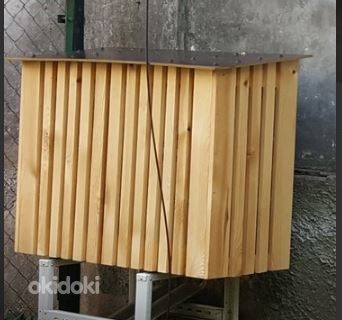 Деревянный защитный короб воздушного теплового насоса (фото #1)