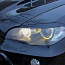 BMW X5 E70 - Uzlikas (skropstas) uz priekšējiem lukturiem (foto #1)