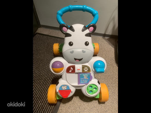 Игрушка ходунки музыкальная