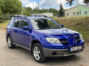 Mitsubishi Outlander | Бензин | мануал (2 фото из 6)