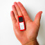 Mikro tālrunis ar izmēru, mazāku par šķiltavas (foto #1)