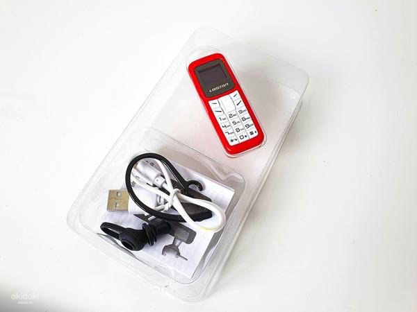 Mikro tālrunis ar izmēru, mazāku par šķiltavas (foto #9)