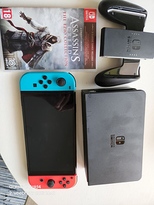 Nintendo Switch OLED (1 foto / 2)