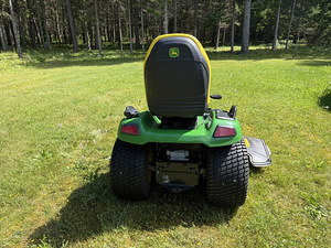 John Deere X590 koos järelkäruga (3 foto / 6)